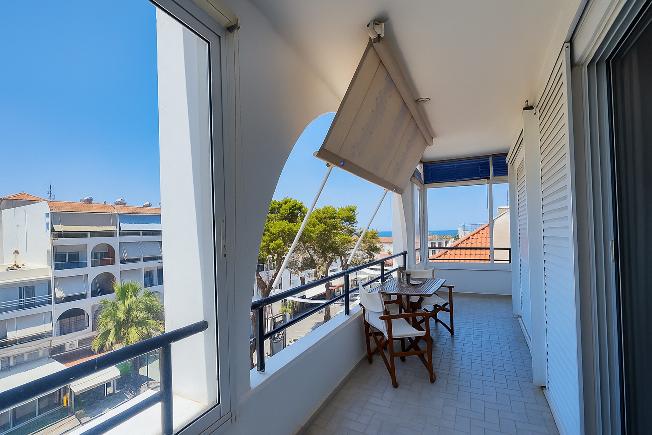 Balcony of Apartment Dream Holidays with outdoor dining area and view over Ialyssos